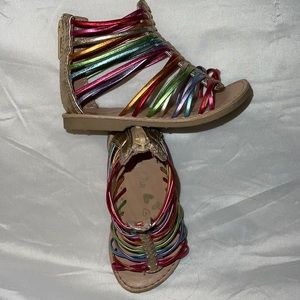 Toddler size 6 Olive & Edie rainbow gladiator sandals.